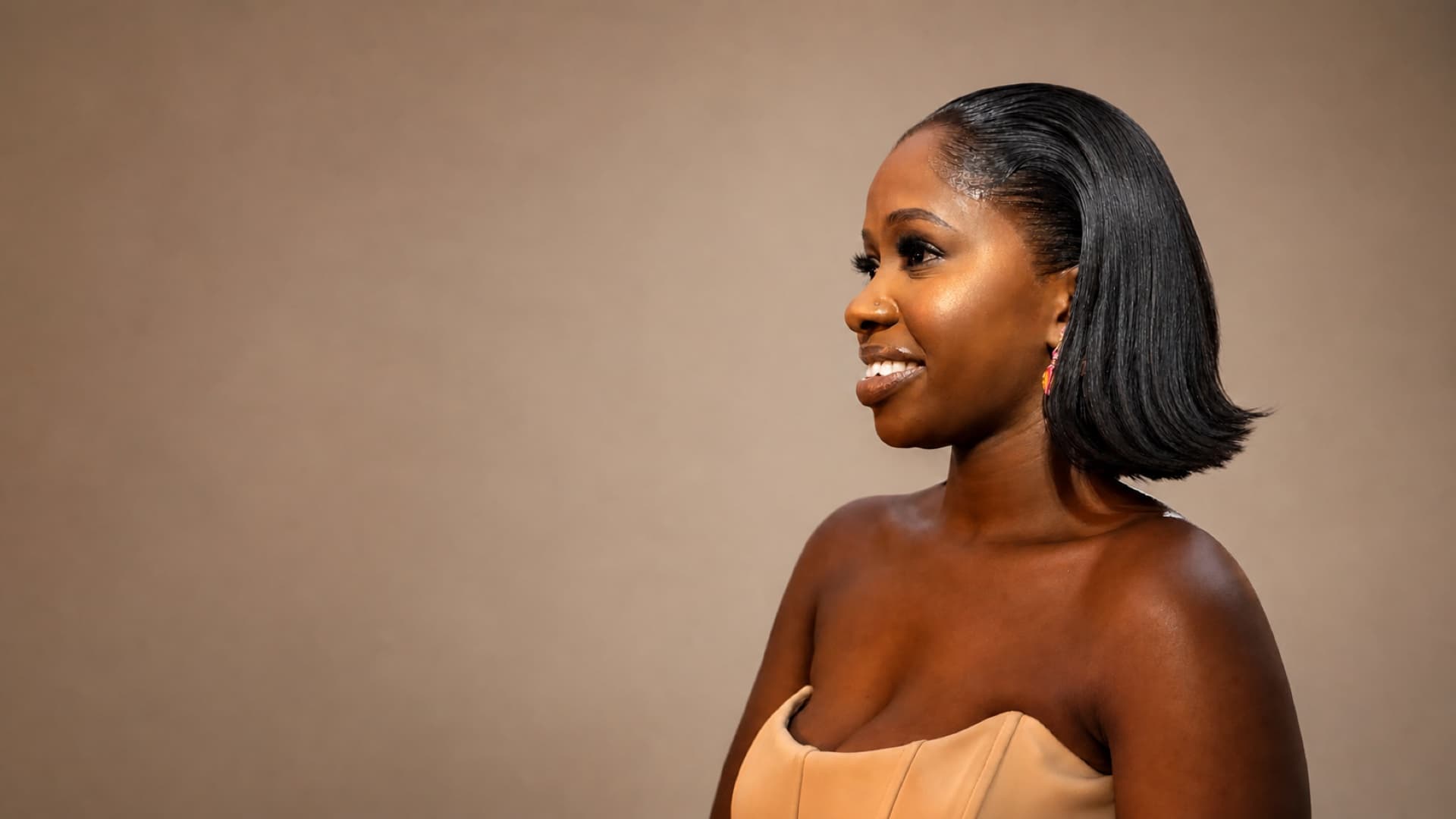 Woman wearing a sleek shoulder-length Your Hair bob